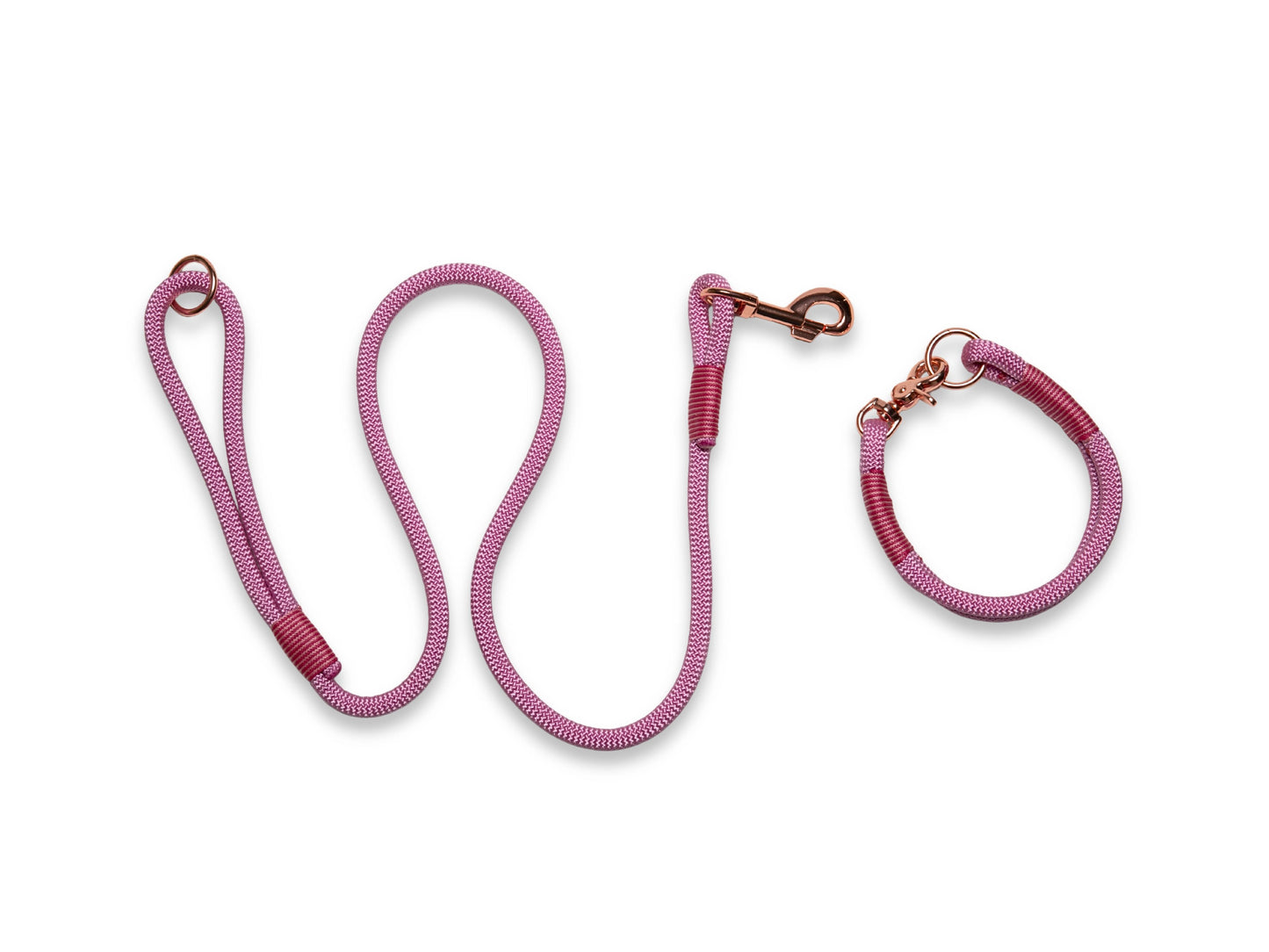 Pink dog rope leash and collar set on a white background