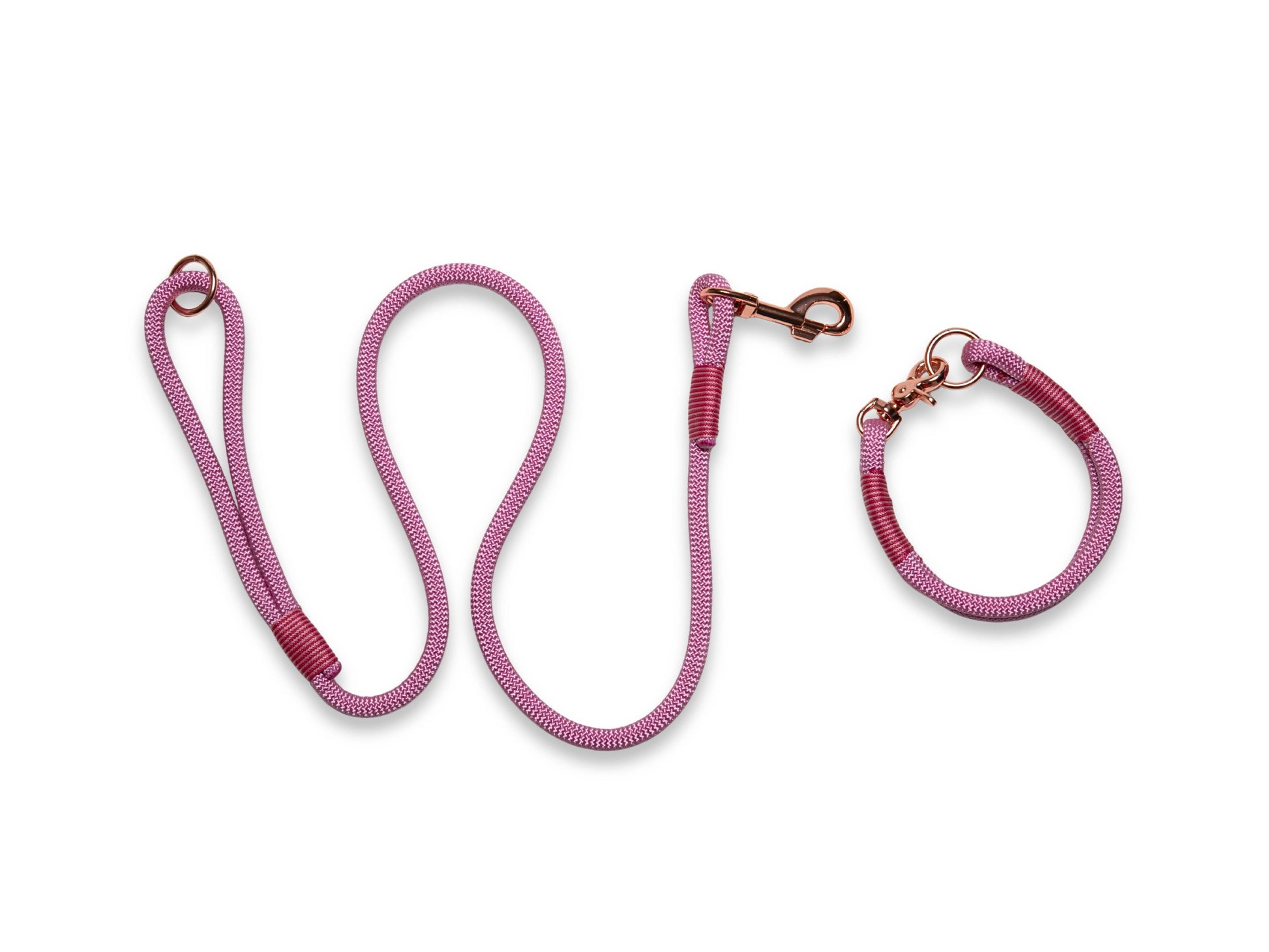 Pink dog rope leash and collar set on a white background