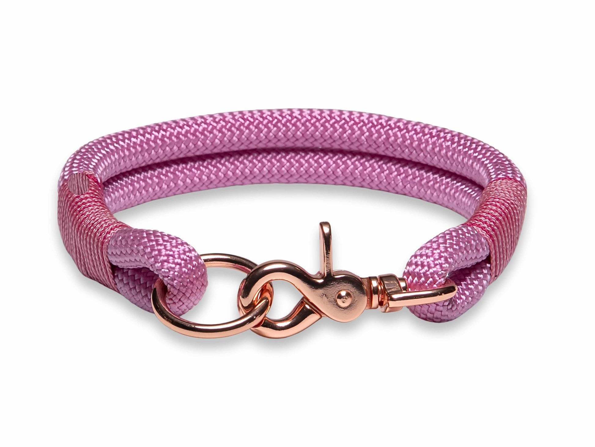 A pink handmade rope dog collar with whipping, displayed on a white background.