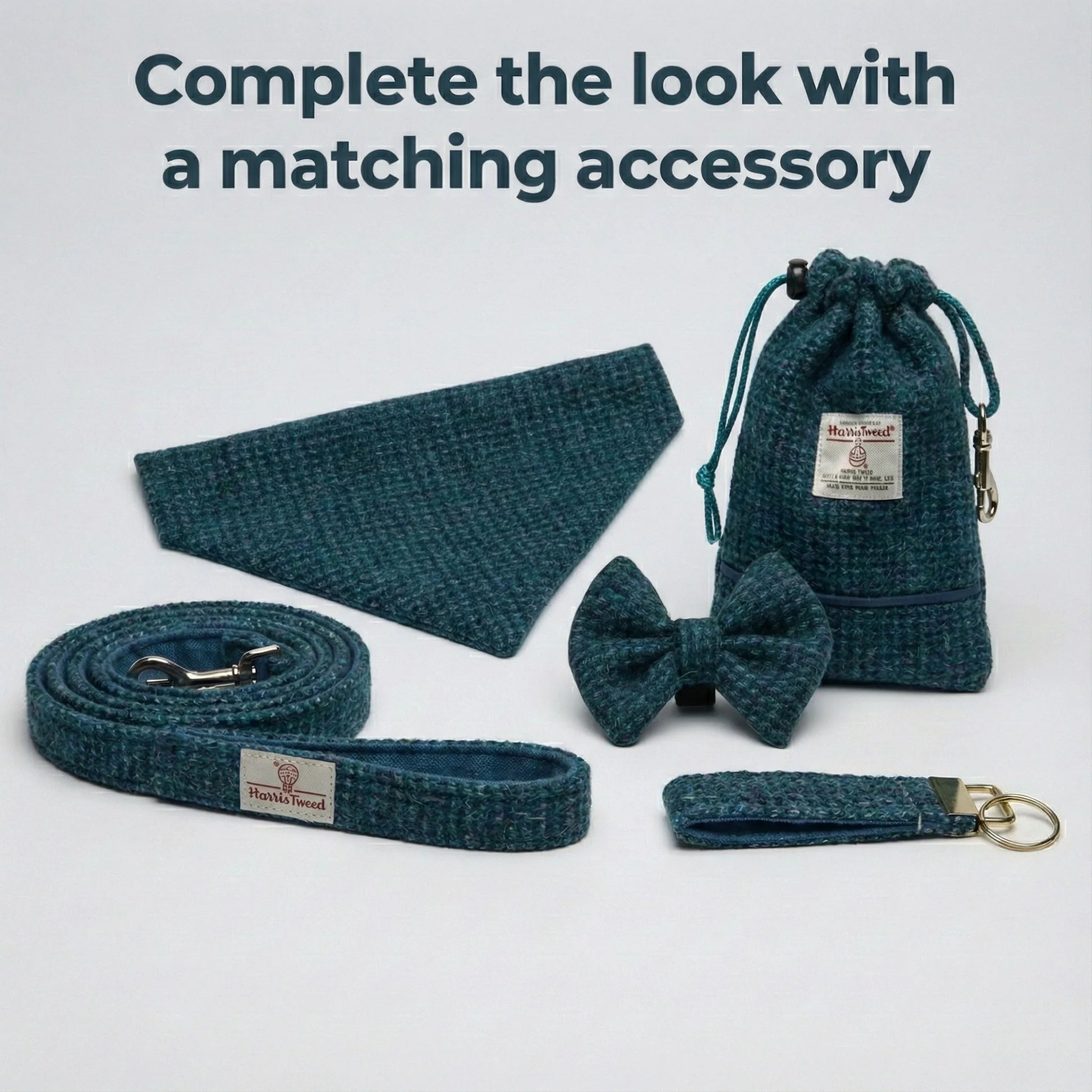 Teal pet accessory set including a bow tie, leash, and pouch on a light gray background.