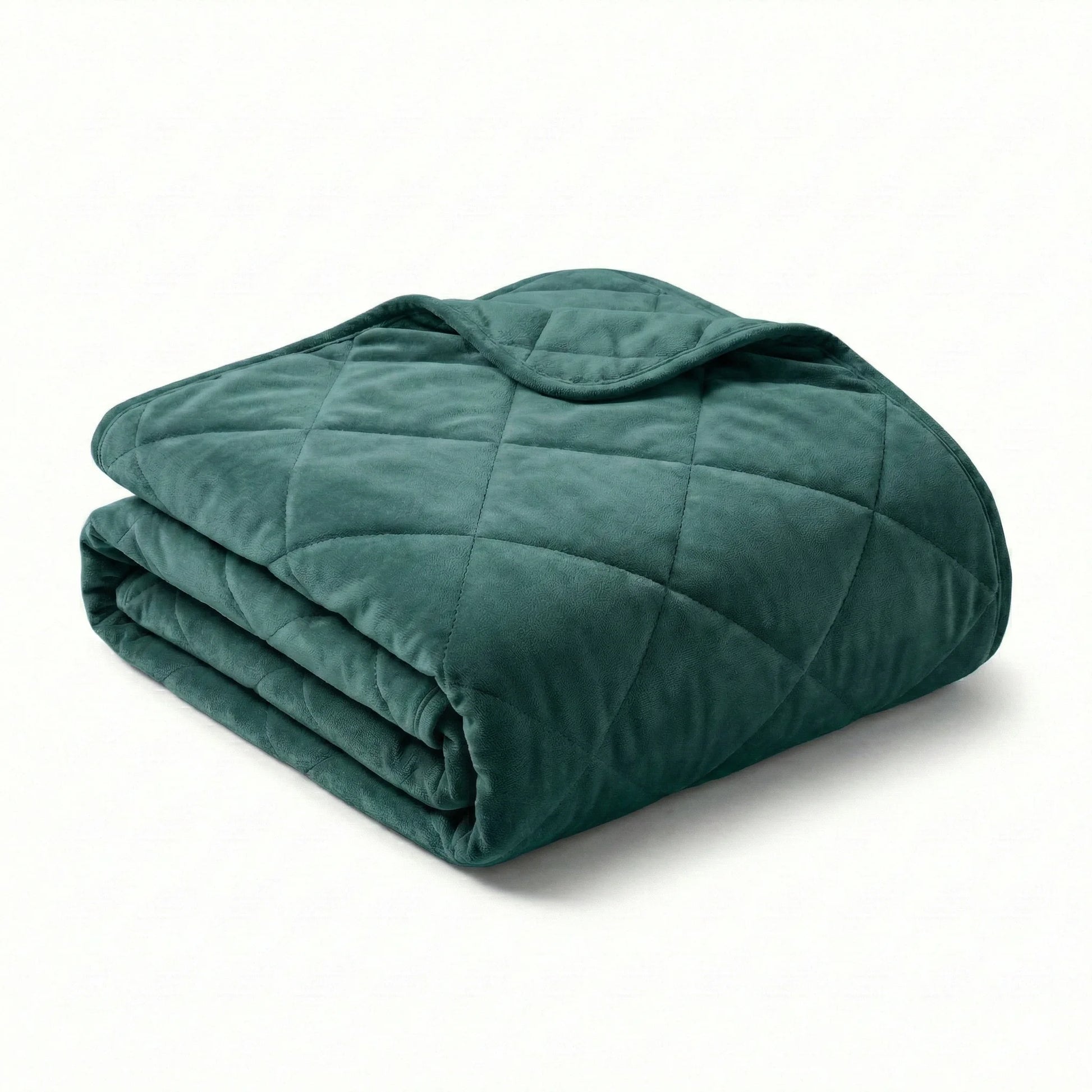 Folded teal weighted blanket on a white background