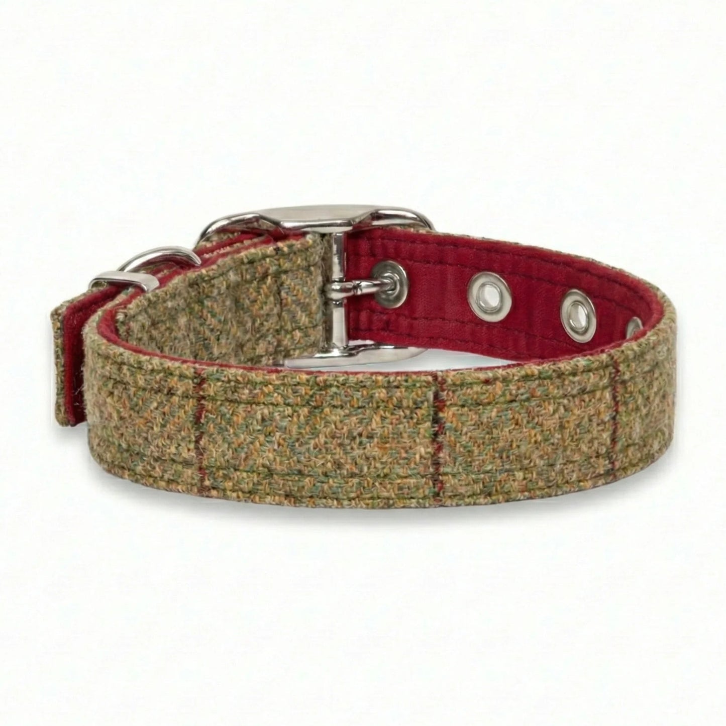 Dog collar with red , green and brown plaid pattern on a white background