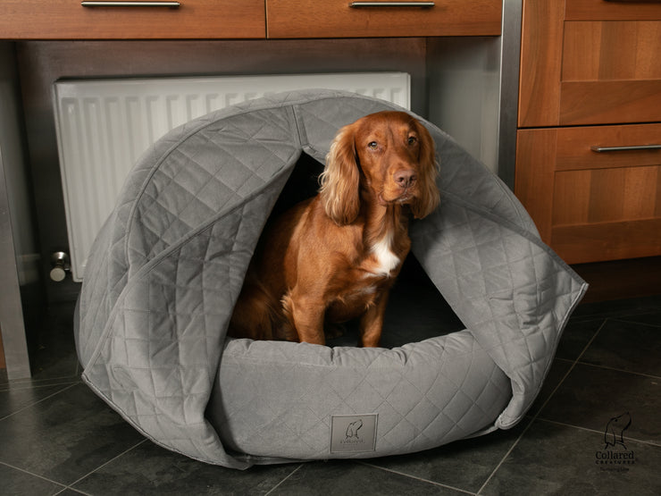 The luxury Collared Creatures Grey Quilted Velour Deluxe Comfort Cocoon Dog Cave Bed