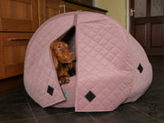 The luxury Collared Creatures Dusky Pink Quilted Velour Deluxe Comfort Cocoon Dog Cave Bed
