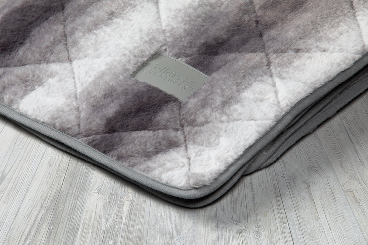 Collared Creatures Luxury Dog Blanket -Sofa Throw In Grey Faux Fur displayed on a grey background