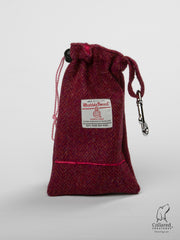 Product shot of Collared Creatures Raspberry Harris Tweed & Coral Treat Bag
