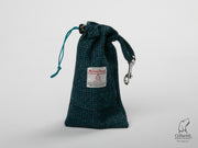 Product photo of collared creatures teal with a touch of blue Harris Tweed treat bag